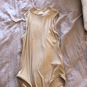 Tan body suit
